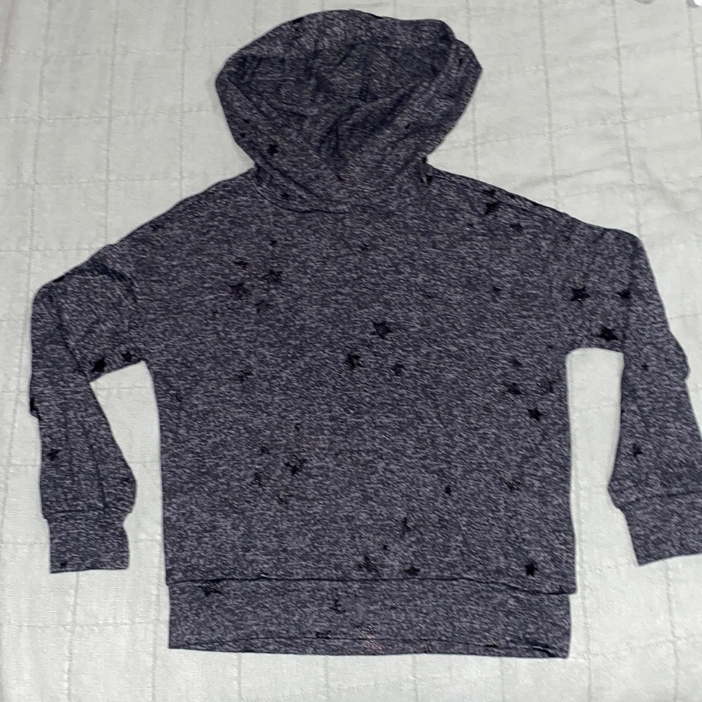 Long sleeve black hoodie with star designs all around. No use 10/10 condition